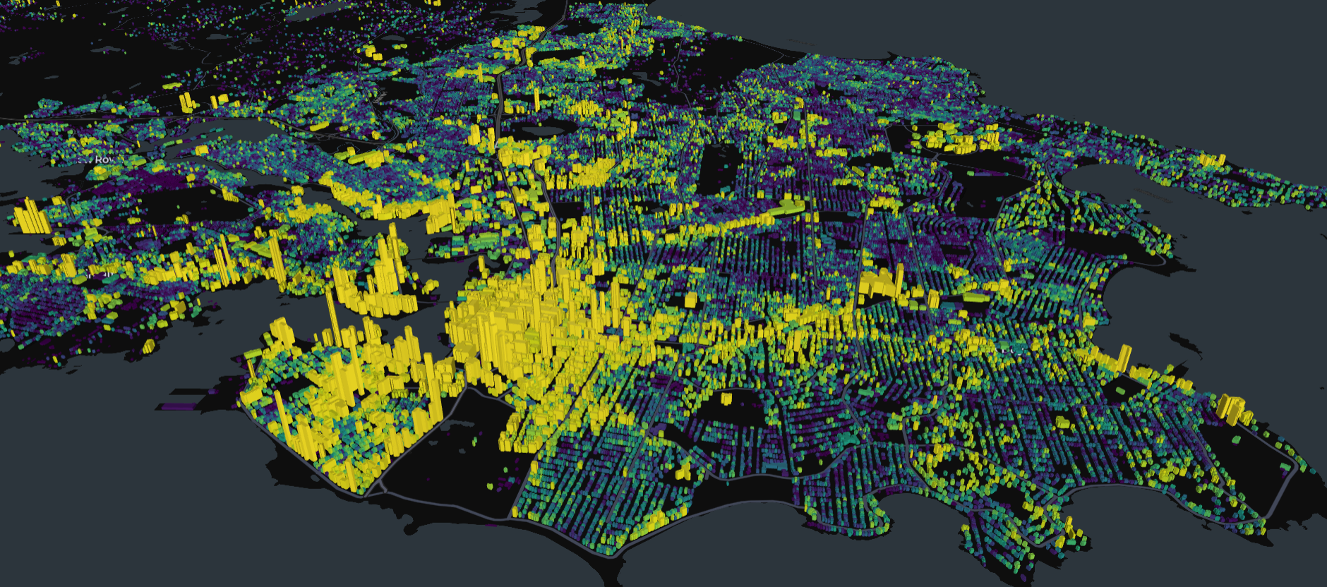 An aerial view of a 3D model of Victoria, with building heights vertically exagerated and coloured based on height. Most tall buildings are downtown, with corridors of denser development along Fort St,  Vic West, the edge of Oak Bay, and UVic.